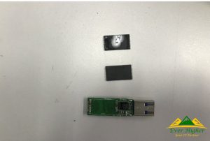 take out the memory chip of the USB and label the memory chip 1 and 2 to denote the front and back